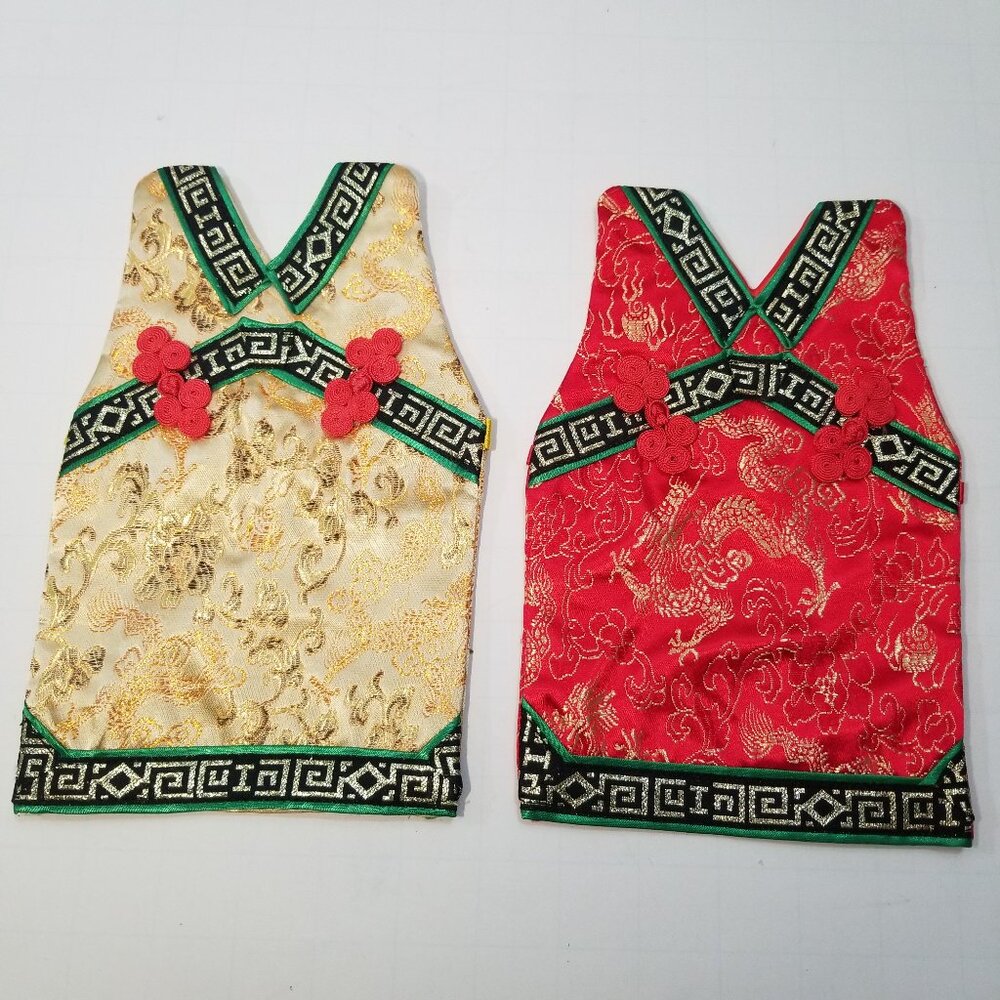 Wine Holders. Asian style wine holders in red and gold (2 total)